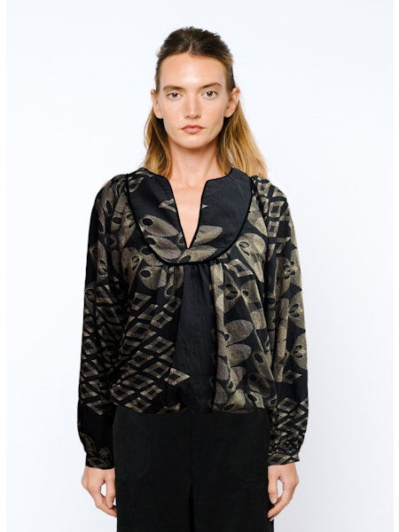 BRIELLE RAGLAN SLEEVE BUBBLE HEM TOP