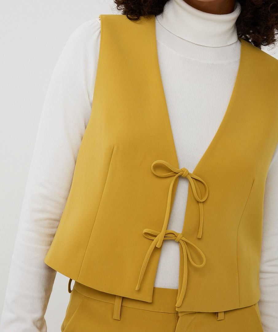 BOWS VEST WITH TIES