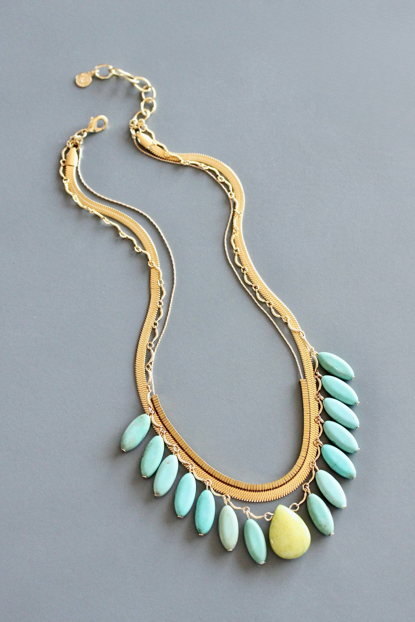 MLN2016 Triple strand turquoise and snake chain necklace